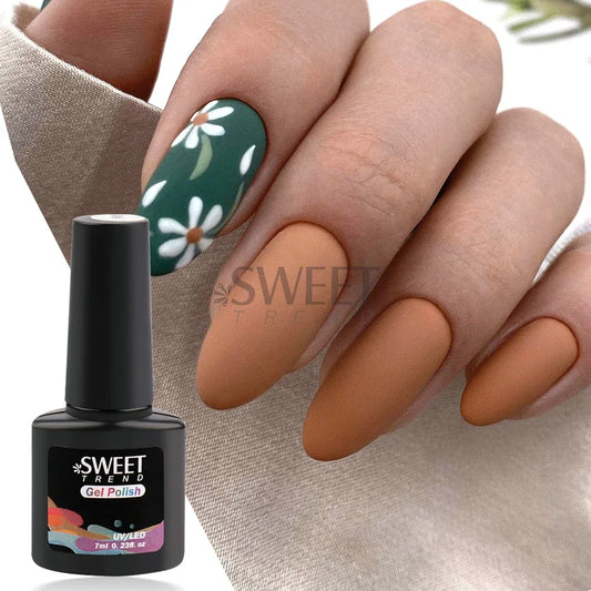 Hand with brown nail polish holding a bottle of Sweet Trend gel polish.