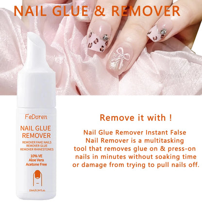 Nail glue remover bottle with false nails and pink fabric background