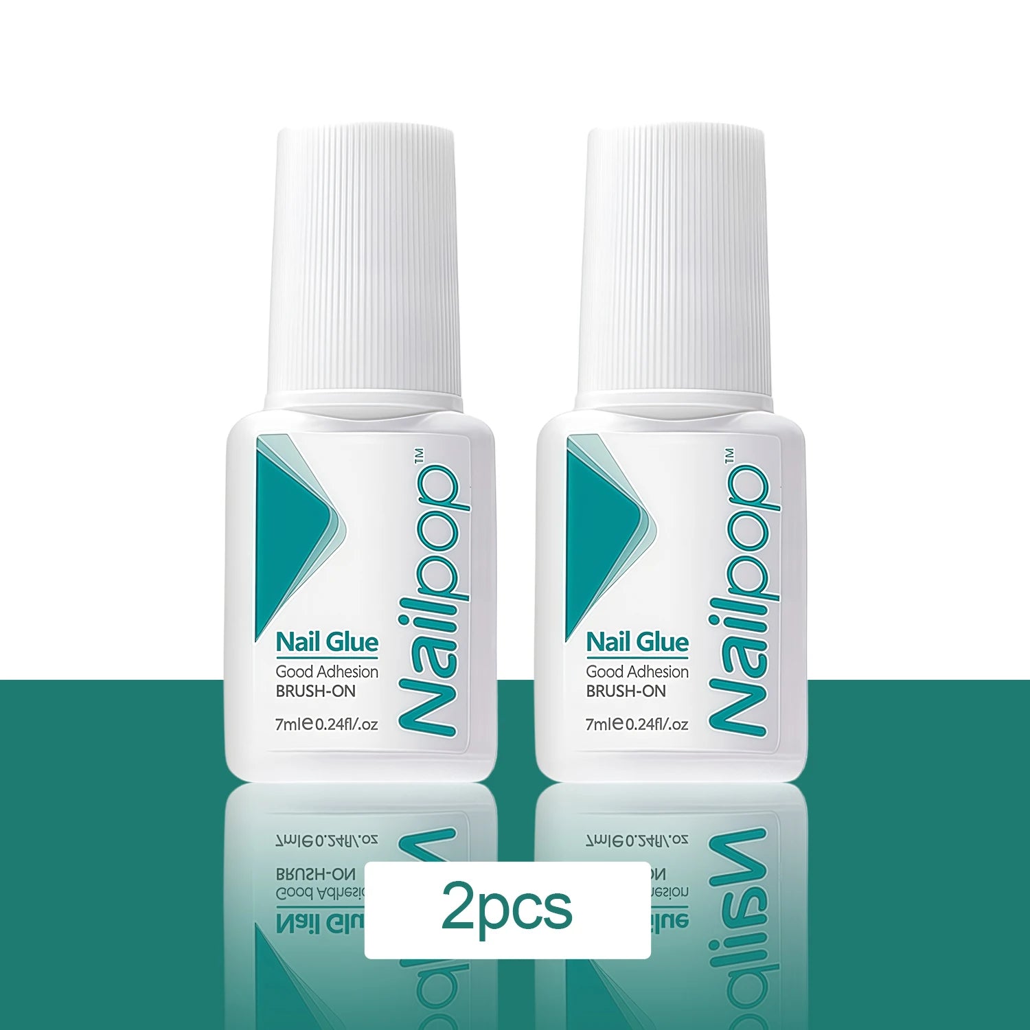 Two bottles of Nailpop nail glue on a reflective green surface with a white background