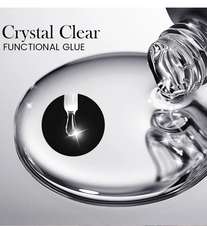 Bottle of crystal clear functional glue with a droplet on a reflective surface.