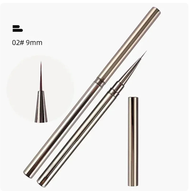 Metallic pen with interchangeable nozzles on a white background