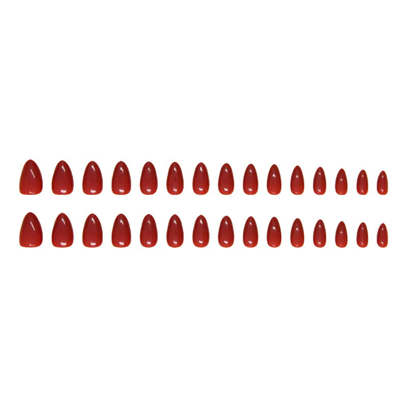 Row of red nail polish on a white background