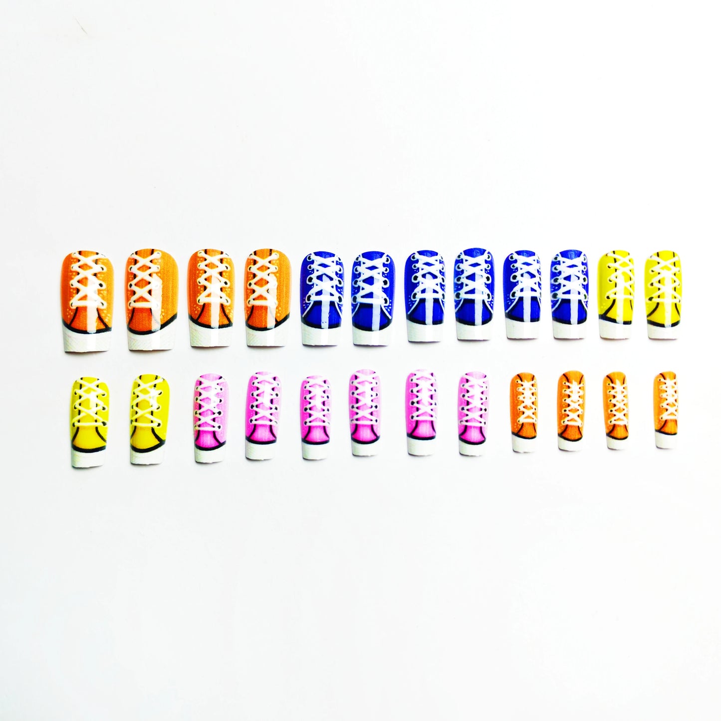 Set of colorful shoe lace extensions on a white background