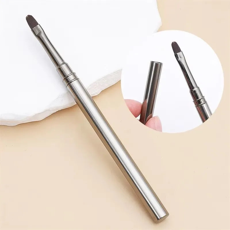 Makeup pen with a black tip on a beige background
