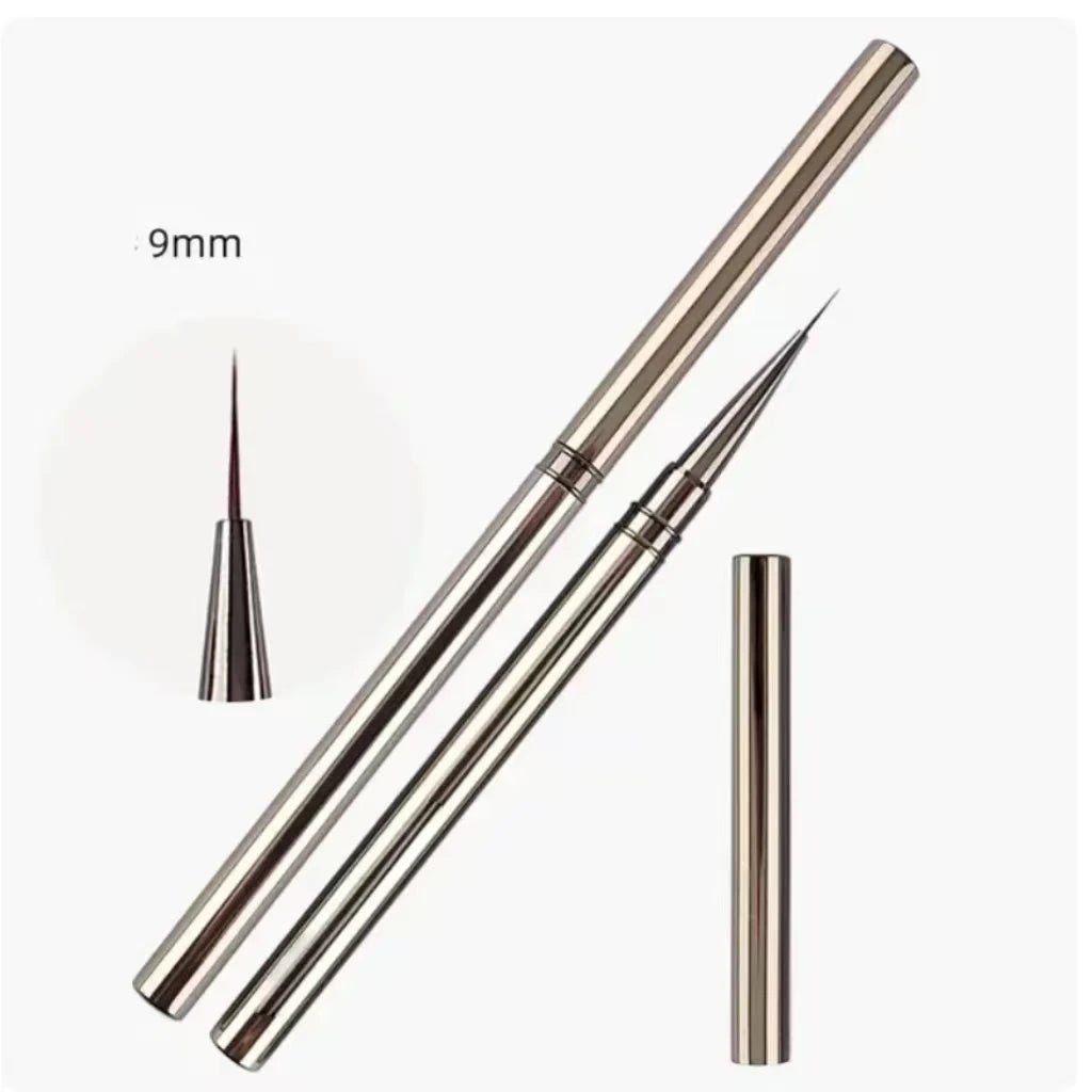 Metallic tattoo pen with interchangeable nozzles on a white background