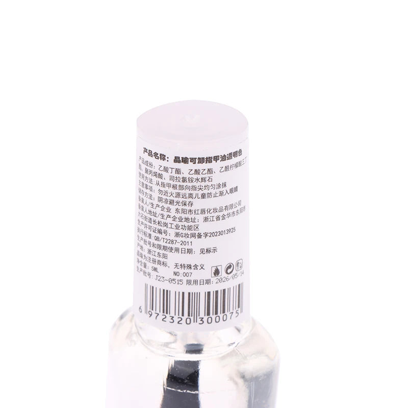 Close-up of a bottle label with text and barcodes on a white background