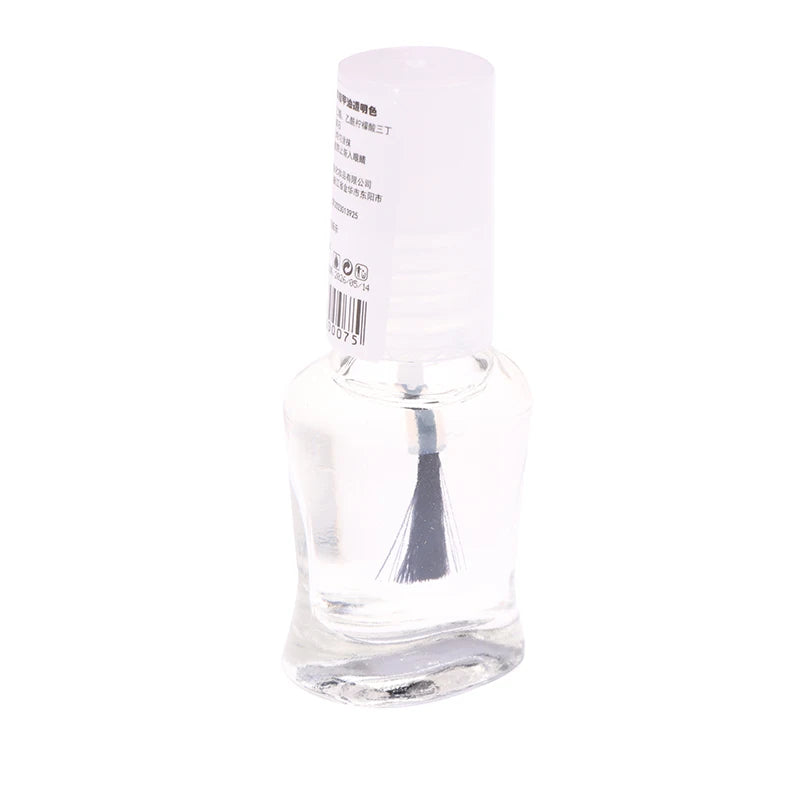 Clear nail polish bottle with visible label on a white background