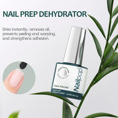 Nail prep dehydrator bottle with green leaves in the background