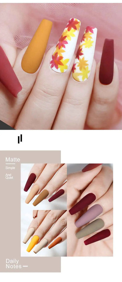 Nail art with colorful designs and a brand logo at the bottom.