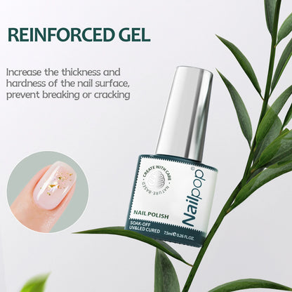 Nail polish bottle with text about reinforced gel on a light background with leaves.